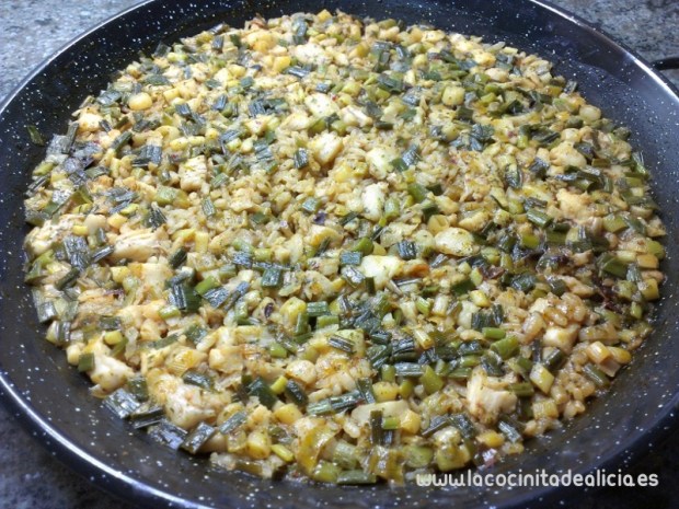 Arroz merluza y ajos tiernos